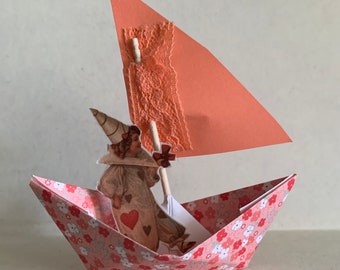 whimsical paper sail boat harlequin girl