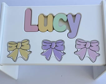 Children's Personalized Step Stool with Puzzle Piece Design.
