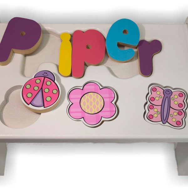 Children's Personalized Step Stool with Puzzle Piece Design.