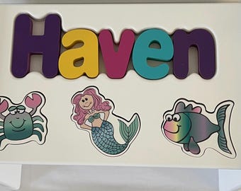 Children's Personalized Step Stool with Puzzle Piece Design.