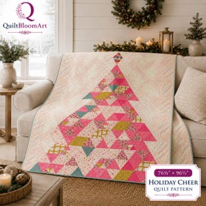 May include: A quilt featuring a large, central Christmas tree design composed of various pink, green, and floral patterned fabric triangles. The quilt measures 76.5 inches by 96.5 inches and is labeled Holiday Cheer Quilt Pattern.