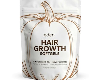 May include: A white stand-up pouch featuring a brown line-art pumpkin illustration. The text reads: eden HAIR GROWTH SOFTGELS PUMPKIN SEED OIL + SAW PALMETTO PREVENTS THINNING | SUPPORTS REGROWTH 1 MONTH SUPPLY. The packaging is matte white with brown text.
