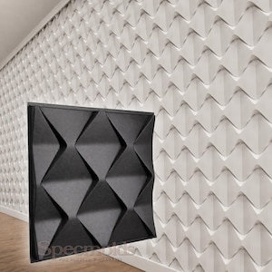 Pode incluir: Um painel de parede quadrado preto com um padrão de diamante tridimensional repetitivo de bordas afiadas e angulares. O painel é exibido contra uma parede branca coberta com painéis idênticos. O texto Specmolds é visível na parte inferior.