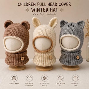 May include: Three children's full head cover winter hats in brown, cream, and gray. Each hat features animal ears, a circular face opening with cream trim, and a ribbed neck warmer section with a single wooden button on the side.