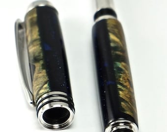 Penna roller in legno tornita a mano - Buckeye Burl Cast in acrilico Blu Fleck - Hardware Rodio - 329Q