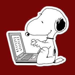May include: A white cartoon dog with a black ear and collar sitting and typing on a grey laptop computer. The dog has a rounded snout and is depicted in a simple black outline style. The laptop screen displays abstract black lines representing text.
