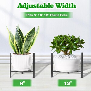 May include: An adjustable black metal plant stand holding two white ceramic pots with plants. The text reads Adjustable Width and Fits 8" 10" 12" Plant Pots, with 8" and 12" labels below the stands, showing the stand accommodating different sizes.
