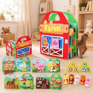 May include: A felt farm-themed activity book set featuring a large red barn-shaped carry case with the word Farm printed on the front. The set includes multiple open book pages displaying various farm animals, crops, and shapes, plus individual felt animal finger puppets.