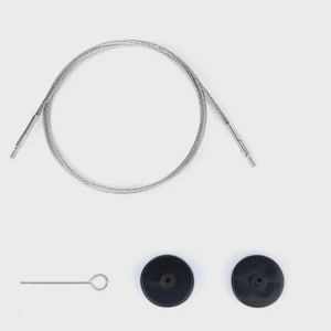 May include: A silver-colored cable, a small metal tool with a loop, and two black circular components are displayed against a white background. The cable is coiled, and the components appear to be parts of a mechanism or tool.