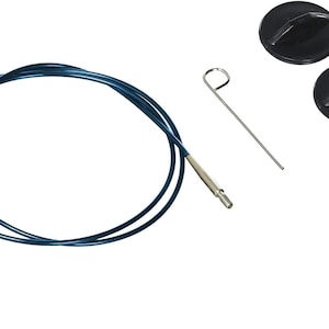 May include: A set of knitting accessories, including a blue cable needle, two black stitch holders, and a silver crochet hook. The cable needle is a flexible, dark blue cord with metal tips. The stitch holders are round and black.