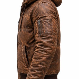 May include: A brown hooded jacket with a distressed leather-like texture, featuring a front zipper, a zippered utility pocket on the upper left sleeve, side pockets, and dark brown ribbed cuffs and hem, captured from a side profile view.