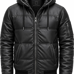 May include: A black leather jacket with a quilted design, a hood with drawstrings, and a front zipper closure. The jacket features ribbed cuffs and a hem, two side pockets, and a small zippered utility pocket on the left sleeve. A label reads Genuine Leather.
