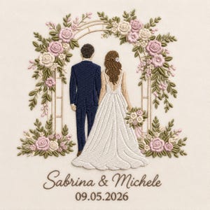 May include: An embroidery design featuring a couple standing under a floral arch with pink and white roses and green leaves. The person on the left wears a dark blue suit, and the person on the right wears a white gown. Text reads Sabrina & Michele 09.05.2026.