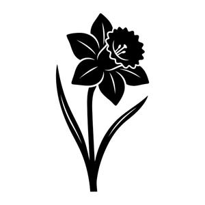 May include: A solid black silhouette graphic of a single daffodil flower. The design features a central trumpet-shaped corona with a ruffled edge, surrounded by six pointed petals, a slender stem, and two long, narrow leaves extending outwards.