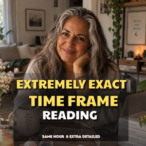 May include: A person with long grey and brown hair sits at a table with tarot cards and a white mug. The text on the image reads EXTREMELY EXACT TIME FRAME READING and SAME HOUR & EXTRA DETAILED. A stack of books with labels including INTUITION is visible.