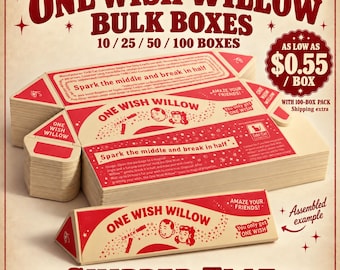 May include: A stack of flat, rectangular cardboard packaging for One Wish Willow, printed in red and cream. The boxes feature illustrations of two faces, the text 'Spark the middle and break in half', and 'You only get ONE WISH'.