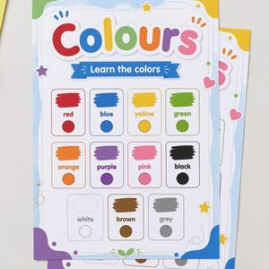 May include: An educational poster titled Colours Learn the colours featuring eleven rectangular boxes, each displaying a colour swatch, the corresponding colour name in text, and a circular dot. The colours include red, blue, yellow, green, orange, purple, pink, black, white, brown, and grey.