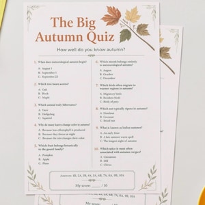 May include: A printed paper sheet titled The Big Autumn Quiz with the subtitle How well do you know autumn? The document features ten multiple-choice questions about the season, decorated with illustrations of autumn leaves and a score box.