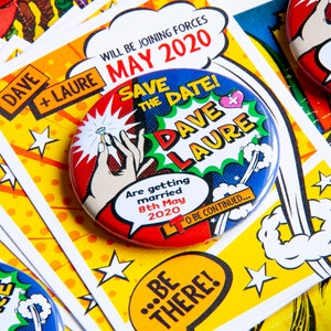 May include: A comic book themed save the date announcement with a red, white, and blue button featuring a cartoon couple getting married. The text on the button reads "Save the Date! Dave + Laure Are getting married 8th May 2020 To be continued..." The announcement card is yellow with black and red polka dots and stars. The text on the card reads "Dave + Laure Will be joining forces May 2020 Save the Date! ...Be There!"