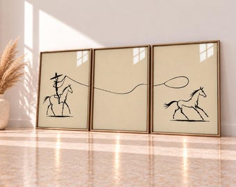 May include: A triptych of three framed prints featuring a continuous black line drawing on a cream background. The left print shows a rider in a sombrero on horseback holding a lasso, which extends across the center print to a running horse on the right.