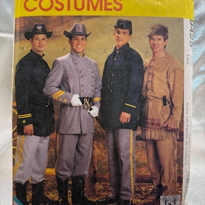 May include: A McCall's Costumes sewing pattern envelope, number 9425, featuring illustrations of four historical outfits: two dark blue military uniforms with light trousers, a grey military uniform, and a tan fringed buckskin-style outfit.