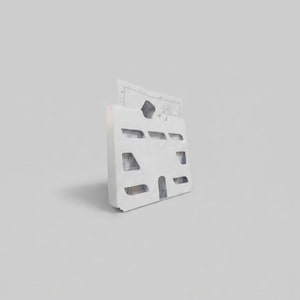 May include: A white rectangular document organizer featuring multiple horizontal and vertical slots for paper storage. The structure is made of a solid material with a clean finish, displaying a single sheet of paper partially inserted at the top.