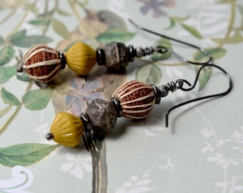 Asymmetrical boho earrings with an eclectic ethnic mix of mustard, brown & black beads and long handmade copper hooks, Wabi sabi jewellery