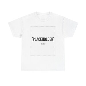 May include: A white short-sleeve t-shirt featuring a central rectangular graphic area outlined by a dashed line. Inside the rectangle, the text [PLACEHOLDER] is printed in bold black capital letters, with smaller text below reading 4500 x 5400 px.