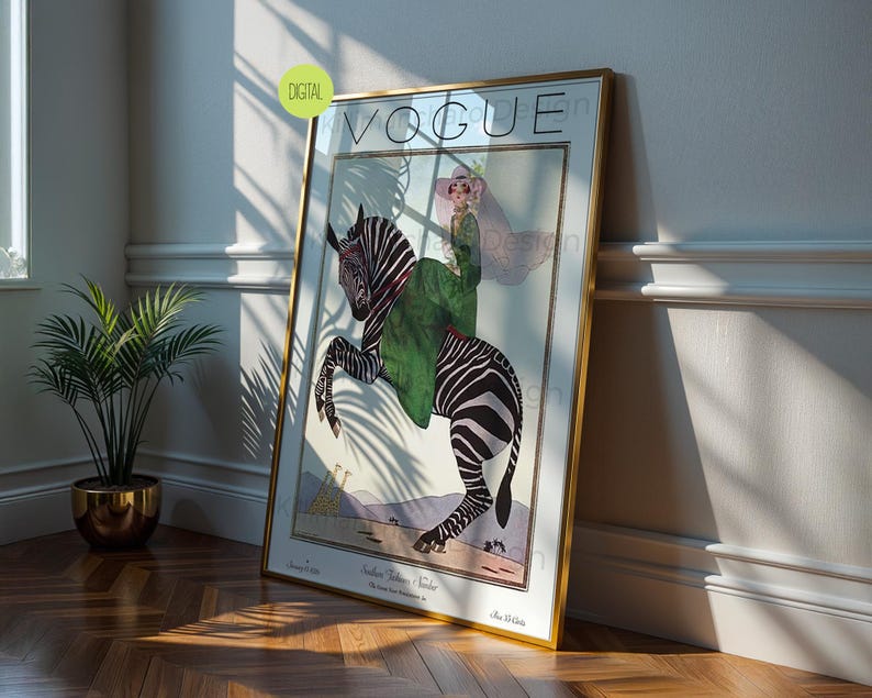 May include: A framed wall art print featuring a vintage Vogue magazine cover illustration. The artwork depicts a person in a green coat riding a zebra, with the text VOGUE at the top and Southern Fashions Number at the bottom, set in a gold frame.