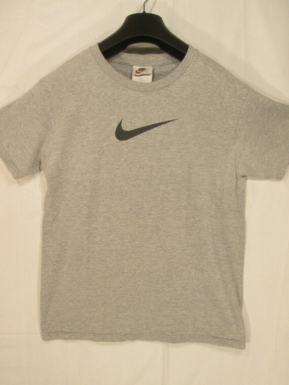 red and gray nike shirt