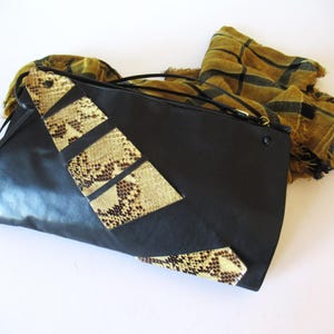 Vintage black leather with snakeskin applique, stylish shoulder bag