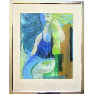 May include: Abstract painting of a woman in a blue dress with flowing blue and green hair. The artwork is framed in a silver metal frame with a white matting.