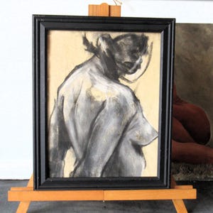 Vintage charcoal and pen study of a woman.