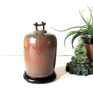 Vintage studio pottery Asian style lidded jar.