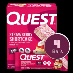 May include: A pink box of Quest Strawberry Shortcake protein bars featuring a graphic of a strawberry shortcake dessert with pink icing. The box displays 20g of protein, 3g of net carbs, and 2g of sugar. A circular badge indicates 4 bars are included.