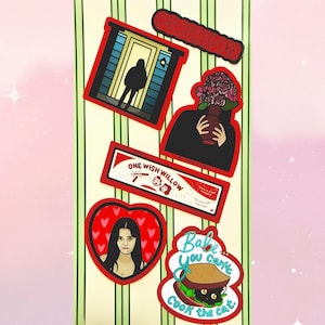 May include: A collection of five colorful stickers featuring various illustrations: a silhouette in a doorway, a person holding a bouquet, a rectangular One Wish Willow label, a heart-shaped portrait, and a sandwich with the text Babe you can't cook the cat.
