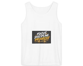 May include: A white sleeveless tank top featuring a rectangular graphic on the chest. The graphic has a dark gray background with the white text FOCUS DISCIPLINE and the yellow text PROGRESS above a yellow illustration of a dumbbell.