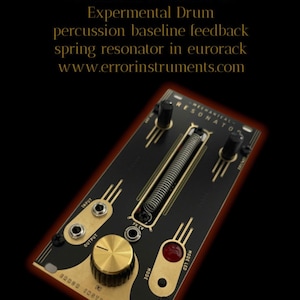 May include: A black and gold Eurorack module with the text "Mechanical Resonator xo" and "RESONATOR" on the front panel. The module has a spring, a knob, and a red LED.