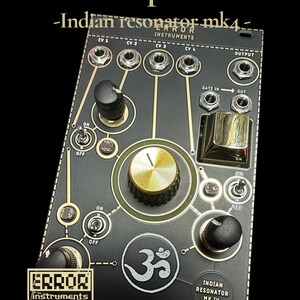 May include: Black electronic instrument panel with knobs, switches, and text that reads "Bansuriphonika - Indian resonator mk4-". The panel has gold and silver accents, and the Om symbol is visible.