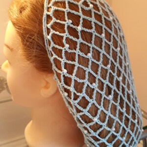 May include: A light blue hairnet with a diamond pattern and white pearl accents.