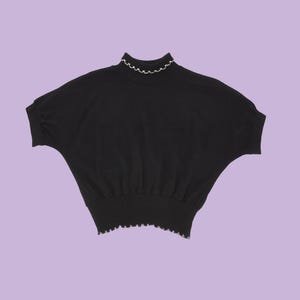 Miss Behave stickad ulltröja från 1950-talet