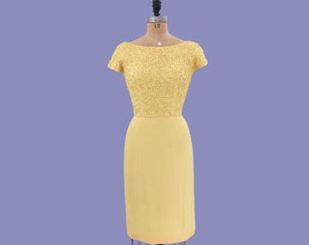 Ein 1960er Jahre Frühling ist Chiffonkleid entsprungen