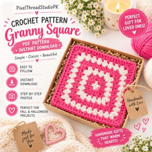 Könnte beinhalten: Ein quadratisches Häkelstück mit abwechselnden Reihen aus pinkfarbenem und weißem Garn, präsentiert in einer Pappschachtel mit braunem Füllpapier. Ein mit Bindfaden befestigtes braunes Papieretikett trägt die Aufschrift Handmade with Love.