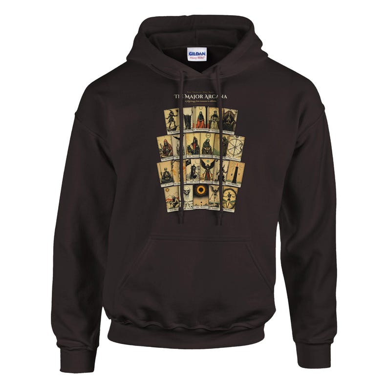 May include: A dark brown hooded sweatshirt featuring a graphic print of twenty-two tarot cards arranged in a grid. The text at the top of the graphic reads THE MAJOR ARCANA. The hoodie includes a front kangaroo pocket and matching drawstring cords.