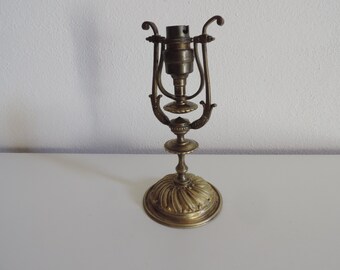 Antique bronze wall or base for a marine lamp with a gimbal arm