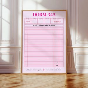 May include: A framed vertical print featuring a pink restaurant guest check design. The text reads DORM 345, DATE 09-05, CHECK NUMBER 806542, and ALICIA - JOANNE - AMELIE - GWEN. The bottom includes the text please come again with a heart and you made our day.