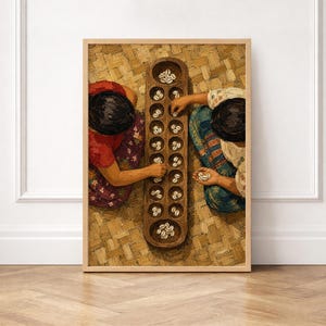 May include: A framed wall art print depicting two individuals playing a traditional board game with cowrie shells on a wooden board with multiple circular pits. The scene is set on a woven mat, showcasing vibrant clothing patterns and textures.