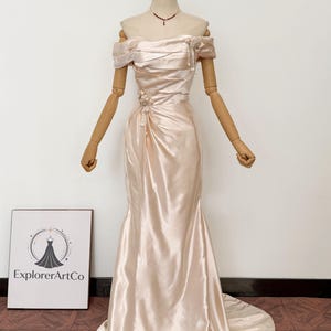 Champagne Pink Satin Off Shoulder Mermaid Grown, Handmade Floral Pearl Tassel Applique