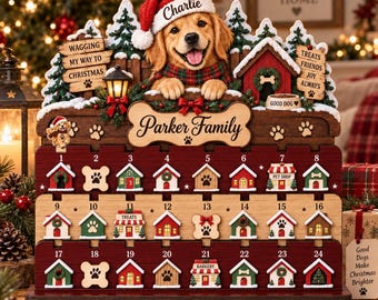 May include: A wooden Christmas advent calendar featuring a golden retriever wearing a Santa hat with the name Charlie, a sign reading Parker Family, and 24 numbered compartments decorated with miniature houses, paw prints, and shop fronts.