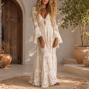 cream lace boho maxi dress Elegant White and Cream Lace Boho Maxi Infinity Dress. Fringe Lace at Shoulder